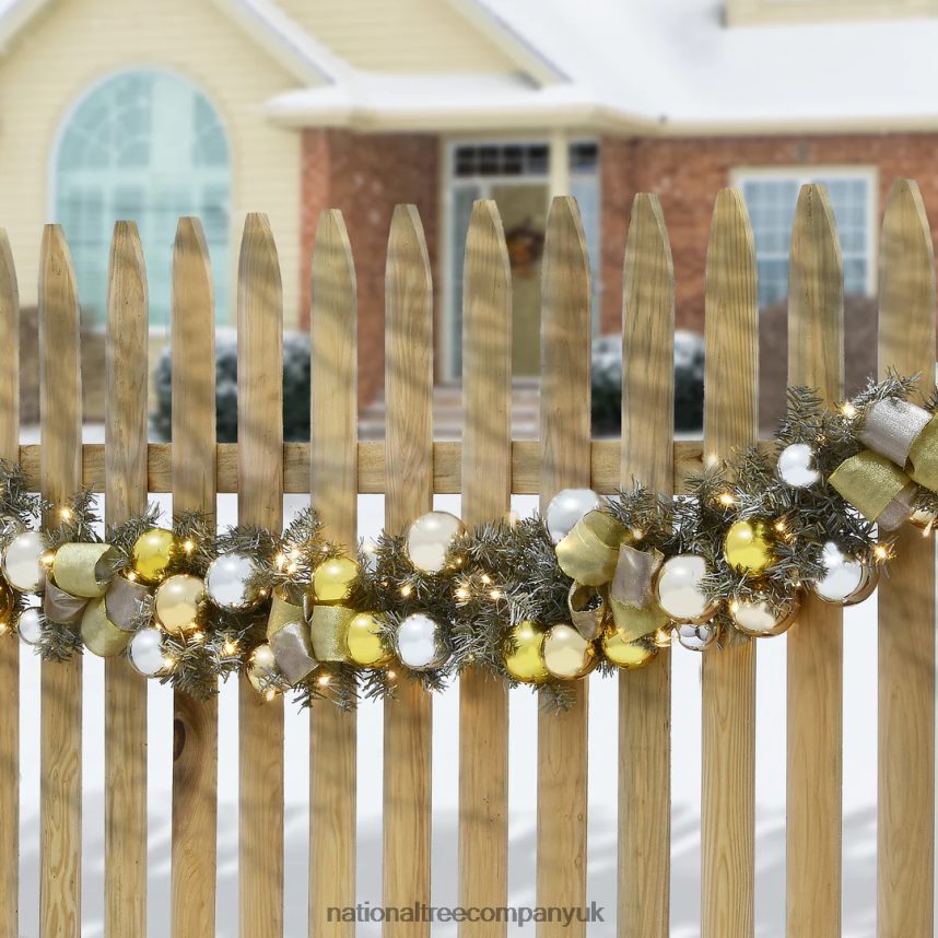 Greenery | National Tree Company Pre Lit Artificial Garland Metallic Gold Decorated with Gold and Silver Ball Ornaments Golden Bows Warm White LED Lights Battery Powered Christmas Collection 9